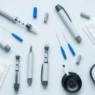 Flat lay of affordable insulin pen needles and diabetic tools, showcasing cheap insulin supplies available on Amazon in 2025.